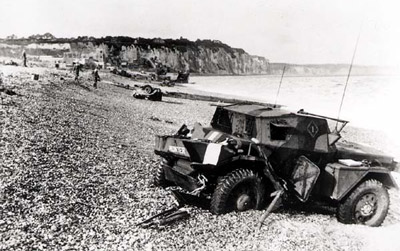 The beach at Dieppe after the raid, showing an abandoned scout car